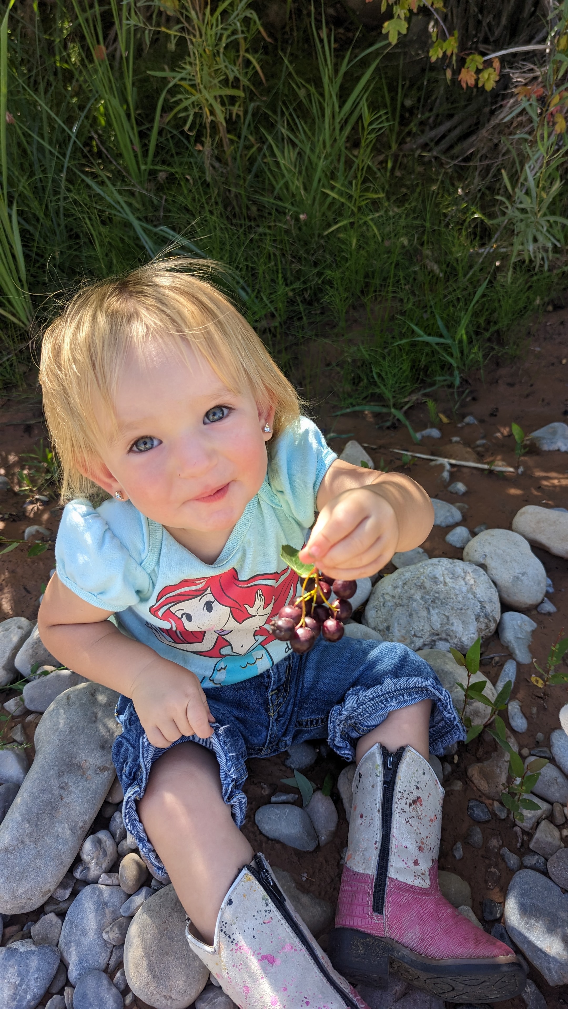 Young child exploring nature outdoors